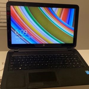 16 inch touch screen HP laptop. Works fine comes with charger